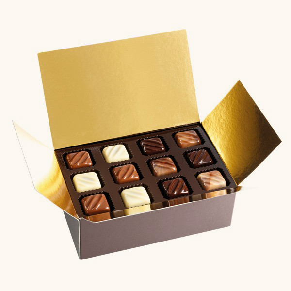 Ballotin de bonbons chocolats fourrés au praliné amandes et noisettes enrobés lait blanc noir